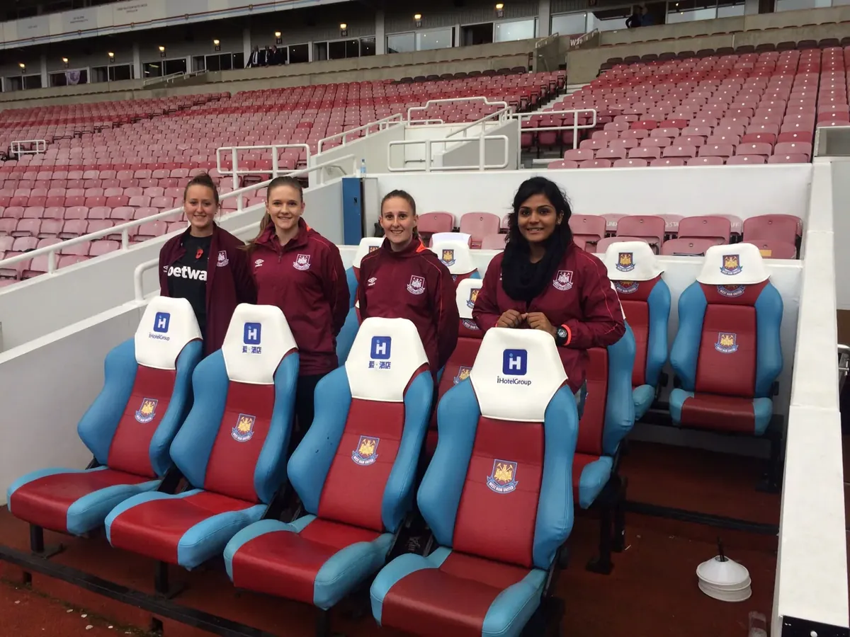 Aditi Chauhan in the dugout during a West Ham United fixture.